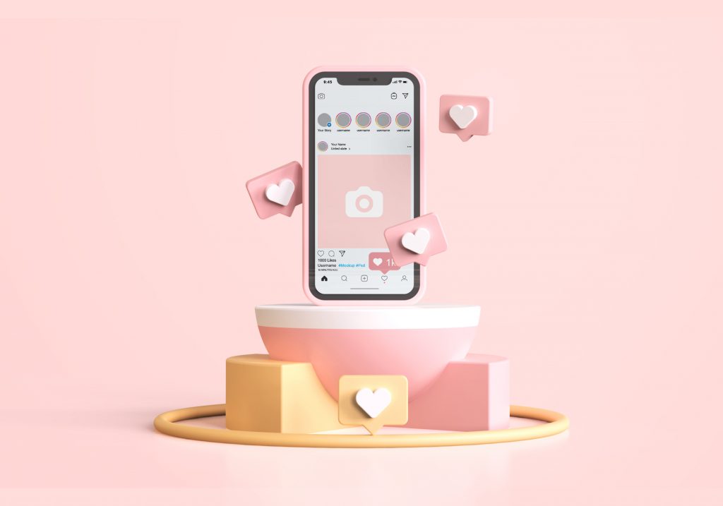 Imagen de teléfono móvil con red social abierta y likes, gestionado por el community manager